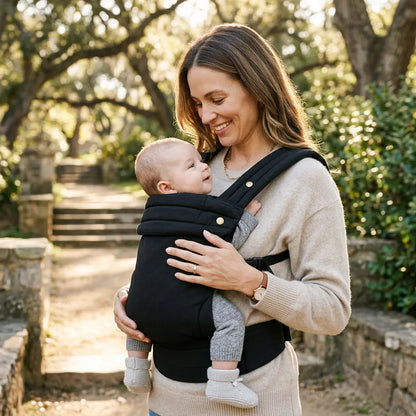 Needella Huggle Baby Carrier Schwarz – schlichtes Design mit optimaler Unterstützung